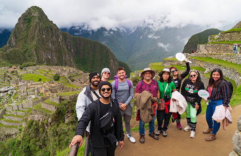 Tourists visiting Machu Picchu